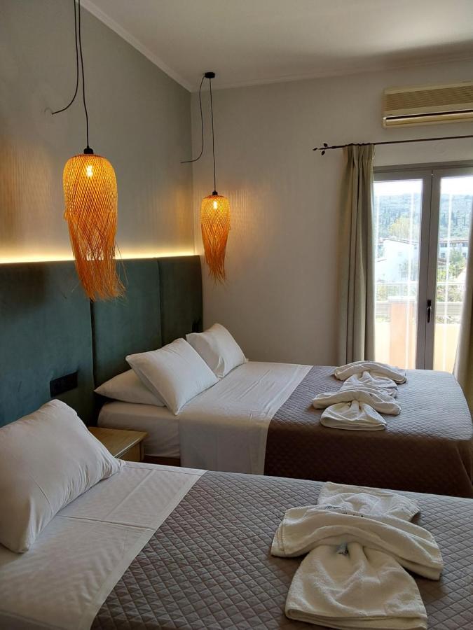 Ninos On The Beach Hotel Roda  Exterior photo