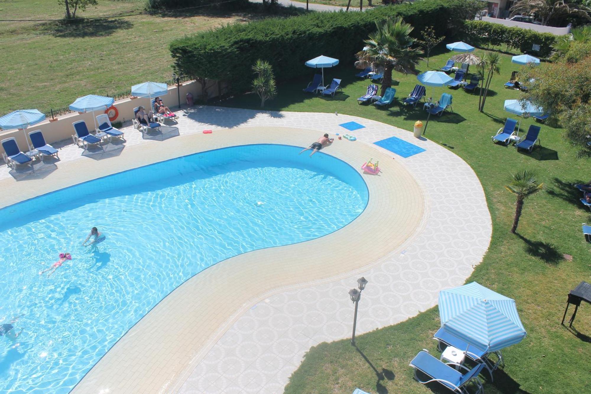 Ninos On The Beach Hotel Roda  Exterior photo