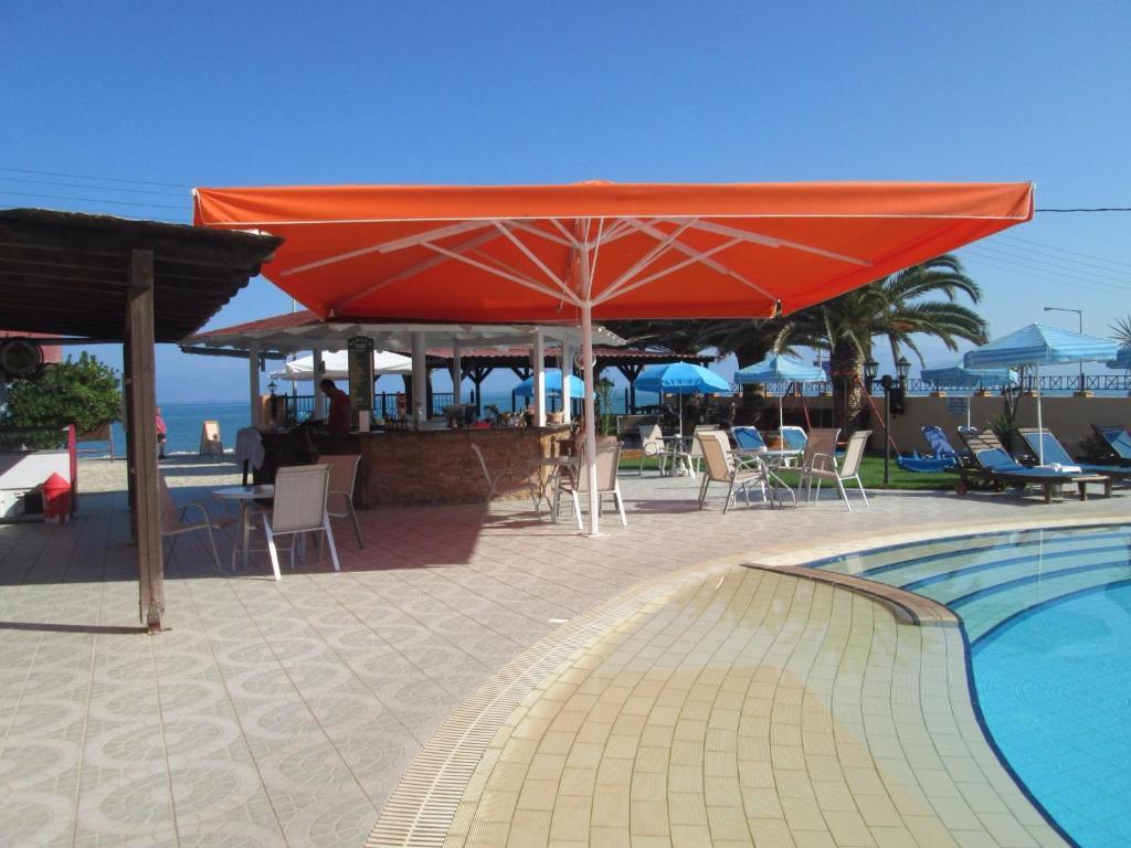 Ninos On The Beach Hotel Roda  Exterior photo